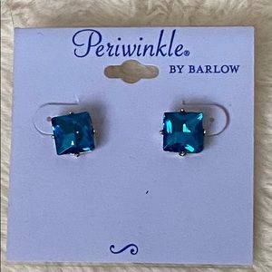 Teal stone earrings. Yellow gold setting.